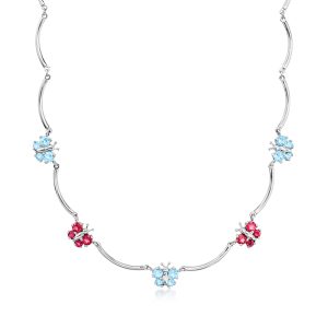 C. 2000 Vintage 2.10 ct. t.w. Sky Blue Topaz and 2.00 ct. t.w. Rhodolite Garnet Butterfly Station Necklace in 18kt White Gold. 15"