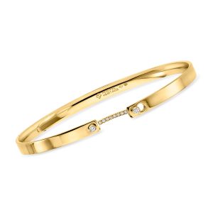 C. 1990 Vintage Nouvel Heritage .15 ct. t.w. Diamond Bangle Bracelet in 18kt Yellow Gold. 7"