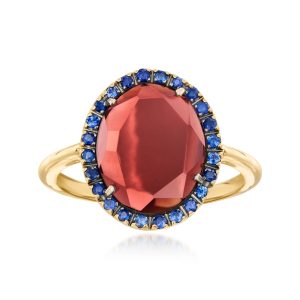 C. 2000 Vintage 3.60 Carat Garnet Ring with .50 ct. t.w. Sapphires in 18kt Yellow Gold. Size 7