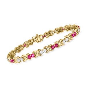 C. 1990 Vintage 2.70 ct. t.w. Ruby and 2.70 ct. t.w. White Sapphire XO Bracelet in 10kt Yellow Gold. 7.5"