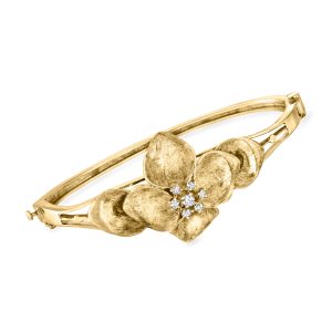C. 1980 Vintage .35 ct. t.w. Diamond Flower Bangle Bracelet in 14kt Yellow Gold. 7"